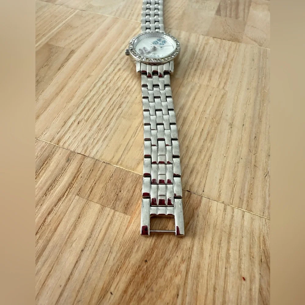 Armitron Now ladies butterfly silver tone watch NEW BATTERY